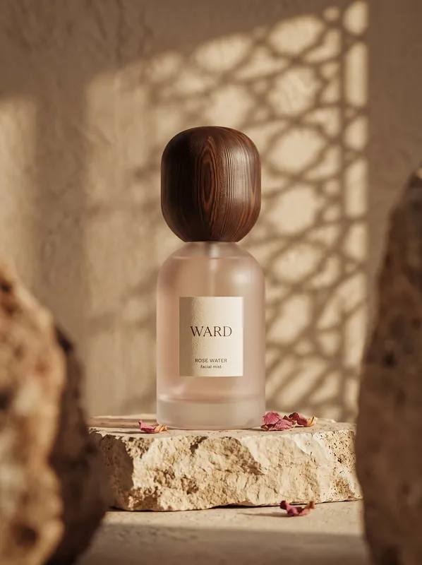 Ward rose mist — quiet-luxury product ad